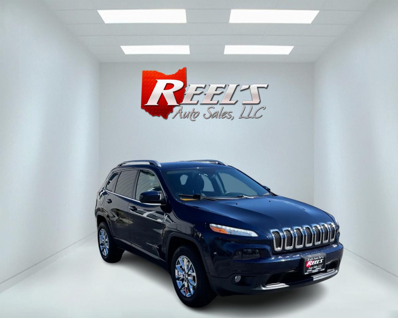 2016 Blue /Black Jeep Cherokee Latitude 4WD (1C4PJMCS1GW) with an 3.2L V6 DOHC 24V engine, 9-Speed Automatic transmission, located at 11115 Chardon Rd. , Chardon, OH, 44024, (440) 214-9705, 41.580246, -81.241943 - Photo#2